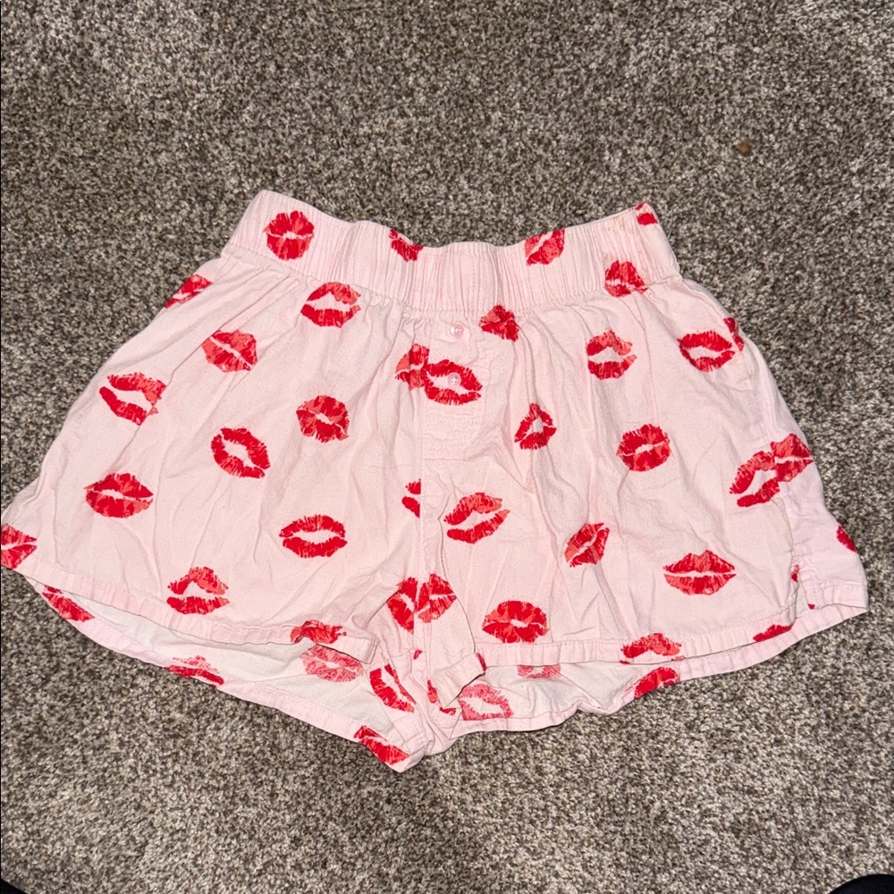 Colsie Pink Shorts with Red Kiss Print